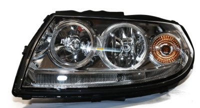 Фара Уаз Патриот старого образца пластик левая