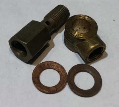 Болт с муфтой и шайбами переднего опорного диска Уаз под шланг