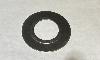 Маслоотражатель (шайба) подшипника вторичного вала Уаз 4-х ступка.