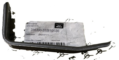 Кронштейн (держатель) троса ручного тормоза Уаз Патриот