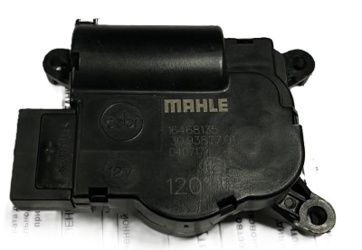 Моторедуктор заслонки отопителя Газель Next возле радиатора отопителя