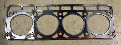 Прокладка (ГБЦ) головки блока цилиндров ГАЗ, УАЗ дв. 402 ЗМЗ 76 бензин 8 окошек с треугольными отверстиями